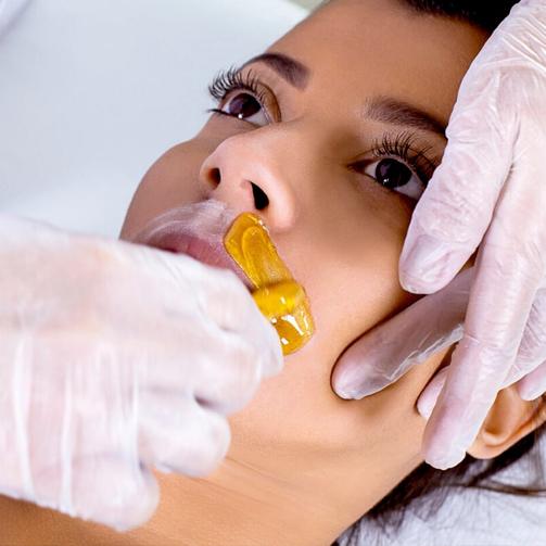 D'Epilação meia facial rosto feminino